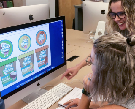 Students reviewing a packaging design for ice cream